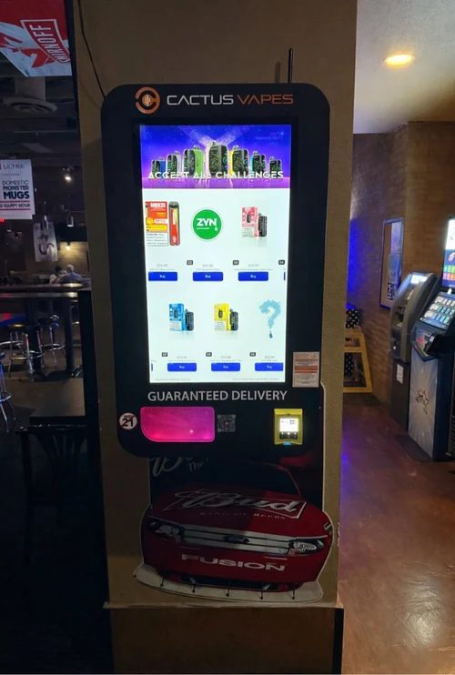 Free-standing black nicotine pouch vending machine with a touchscreen, ID scanner, and card reader.